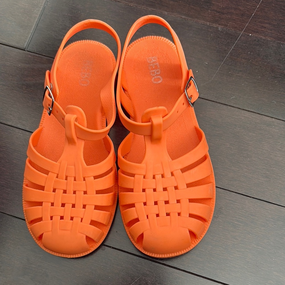 Vibrant Orange Sandals with Adjustable Strap and Lattice Design
